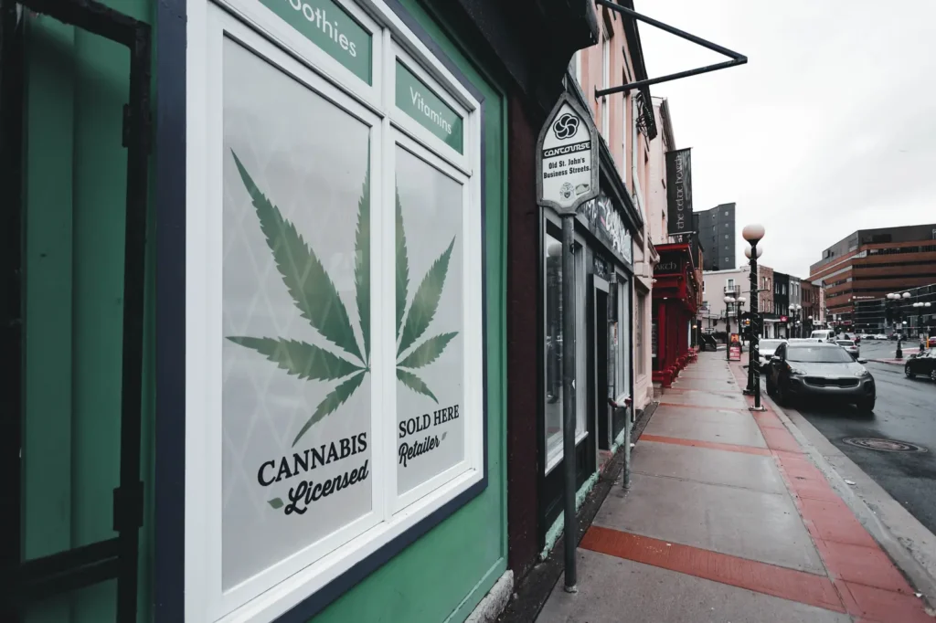 Licensed cannabis retailer window sign, illustrating how cannabis advertising restrictions affect in-store and storefront signage